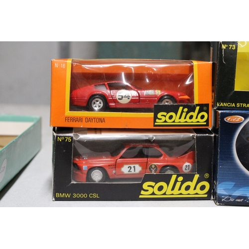 299 - FOUR DIE-CAST SOLIDO CARS TO INCLUDE FERRARI AND LANCIA - ALL AS NEW IN BOXES