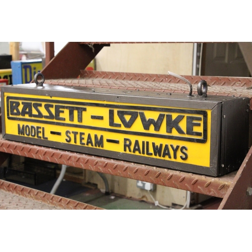 339 - A BASSETT-LOWKE MODEL-STEAM-RAILWAYS DOUBLE SIDED ILLUMINATED SIGN COMPLETE WITH HANGING BRACKET