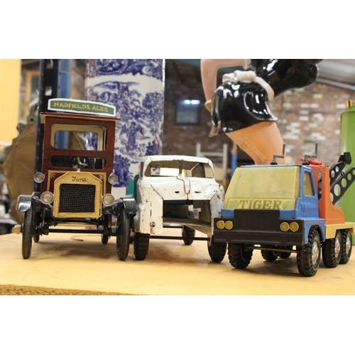 564 - THREE LARGE VINTAGE TRUCKS, TWO METAL AND ONE WOODEN, ONE SCRATCH BUILT