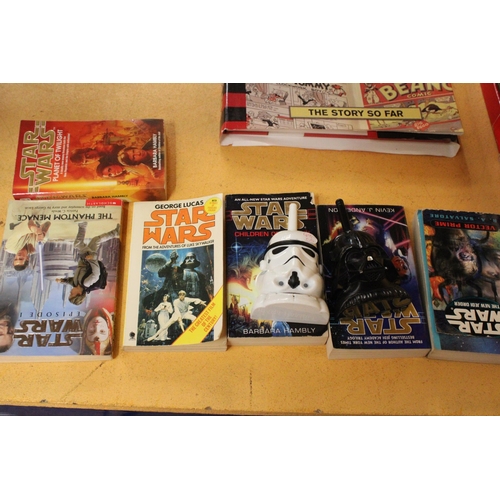 581 - SIX STAR WARS BOOKS AND TWO WALKIE TALKIES