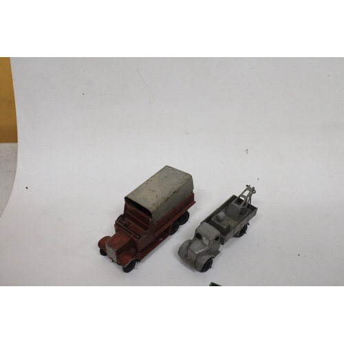 592 - FOUR VINTAGE DINKY MODELS TO INCLUDE A BREAKDOWN TRUCK IN GREY, A LOW SIDED OPEN TRUCK, A SIX WHEELE... 