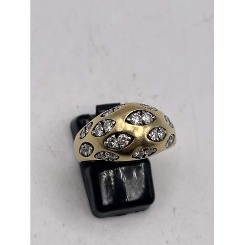 604 - AN GENTLEMAN'S 18 CARAT GOLD AND DIAMOND GYPSY STYLE RING, APPROXIMATELY 1 CARAT OF DIAMONDS, HALLMA... 