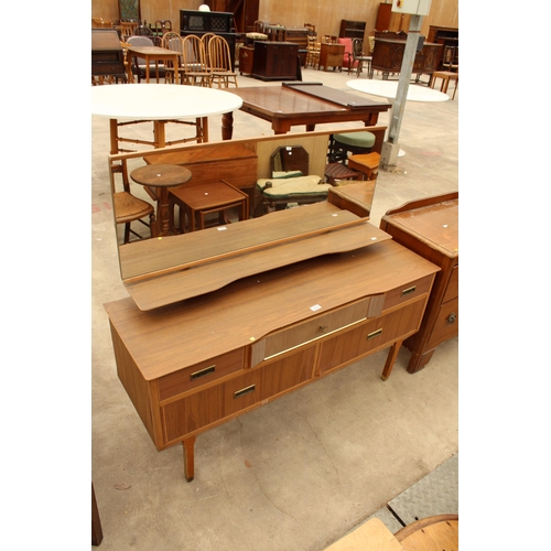 2639 - A RETRO TEAK EFFECT LEBUS DRESSING TABLE ENCLOSING FIVE DRAWERS, 50