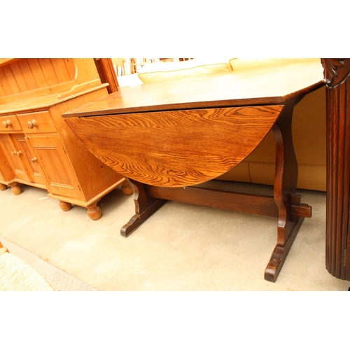 2644 - AN OAK DROP-LEAF DINING TABLE, 48