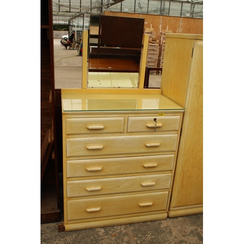 2729 - A MID 20TH CENTURY LIMED COMBINATION WARDROBE CHEST WITH DRESSING TABLE RETURN WITH TRIPLE MIRROR