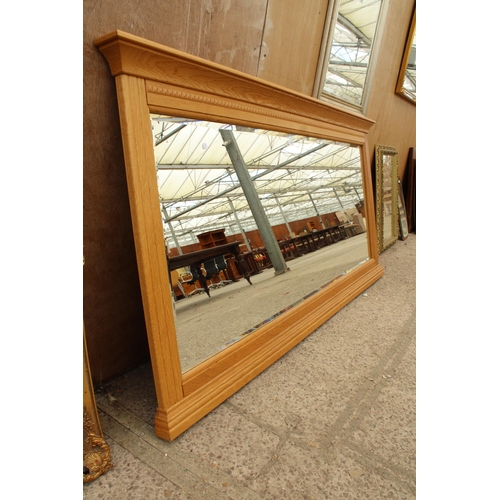 2819 - A VICTORIAN STYLE OAK FRAMED BEVEL EDGE OVERMANTEL MIRROR, 79