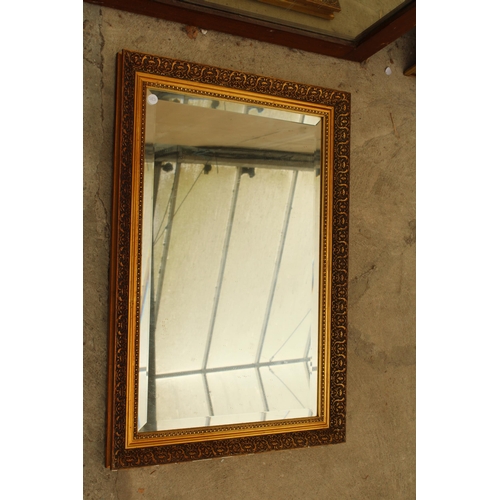 2824 - A GILT FRAMED BEVEL EDGE WALL MIRROR, 30