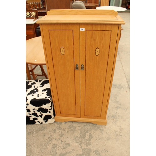 2841 - AN OAK AND INLAID TWO DOOR STORAGE CUPBOARD 27.5