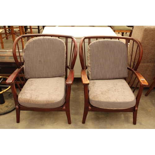 2864 - A PAIR OF PARKER KNOLL STYLE WINGED FIRESIDE CHAIRS