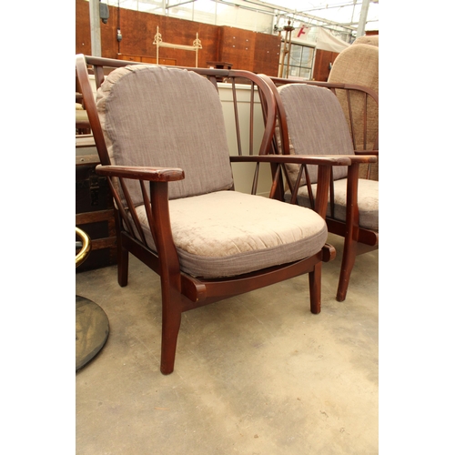 2864 - A PAIR OF PARKER KNOLL STYLE WINGED FIRESIDE CHAIRS