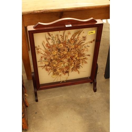 2866 - A 'HEARTH & HOME' FIRESCREEN ENCLOSING DRIED FLOWER DECORATION