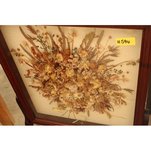 2866 - A 'HEARTH & HOME' FIRESCREEN ENCLOSING DRIED FLOWER DECORATION