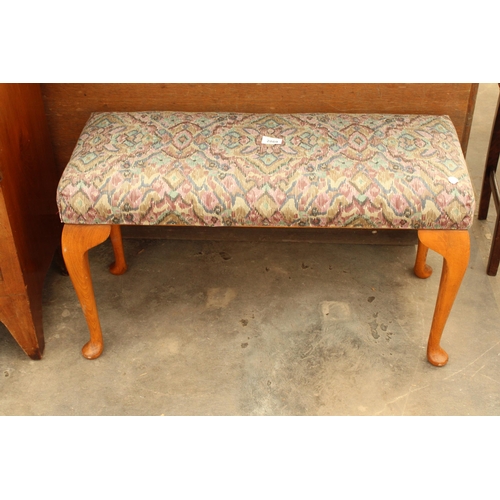 2869 - A MODERN STOOL ON CABRIOLE LEGS