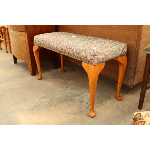 2869 - A MODERN STOOL ON CABRIOLE LEGS