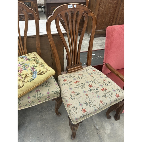 2874 - A PAIR OF MAHOGANY HEPPLEWHITE STYLE DINING CHAIRS WITH WOOLWORK SEATS AND ONE CUSHION