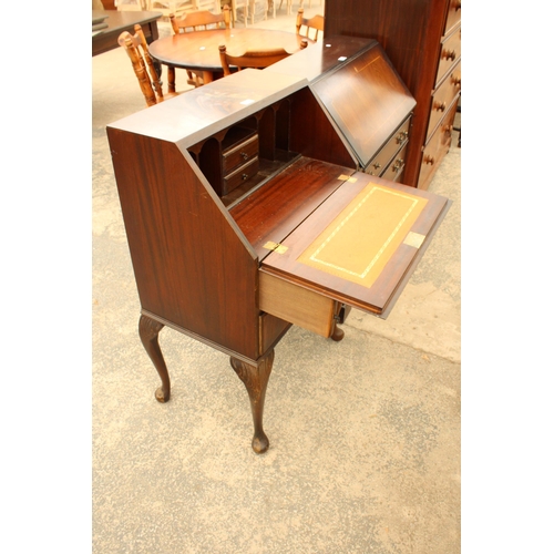 2923 - A MODERN MAHOGANY AND INLAID BUREAU ON CABRIOLE LEGS, 24