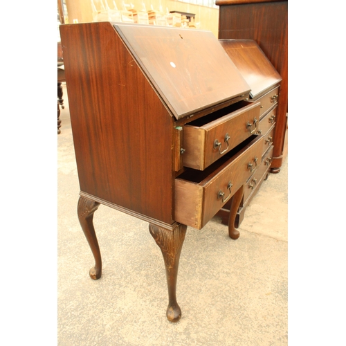 2923 - A MODERN MAHOGANY AND INLAID BUREAU ON CABRIOLE LEGS, 24