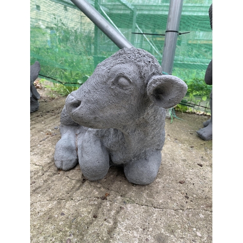 37 - ONE SITTING CALF CONCRETE GARDEN ORNAMENT APPROX 50CM IN LENGTH AND 28CM IN HEIGHT PLUS VAT