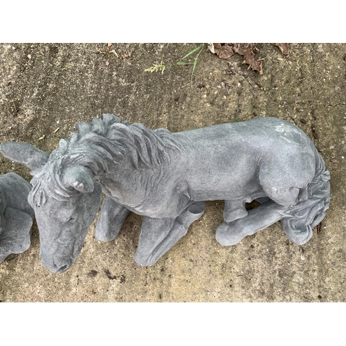 67 - ONE HORSE LYING DOWN CONCRETE GARDEN ORNAMENT APPROX 40CM IN LENGTH PLUS VAT