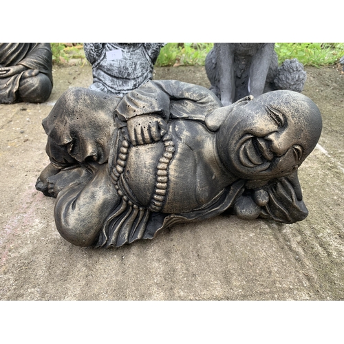 72 - ONE BUDDHA LYING DOWN CONCRETE GARDEN ORNAMENT APPROX 38CM IN LENGTH PLUS VAT