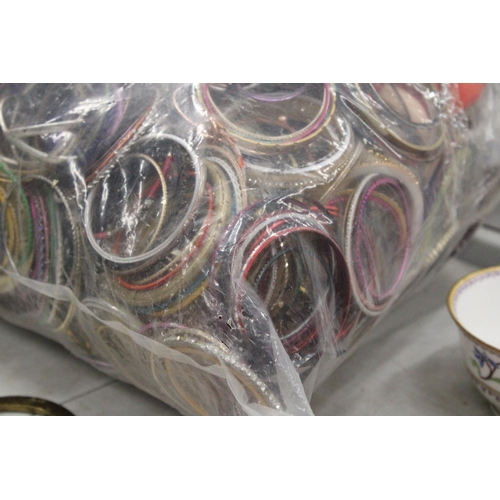 220 - AN 8KG BAG OF COSTUME JEWELLERY BRACELETS