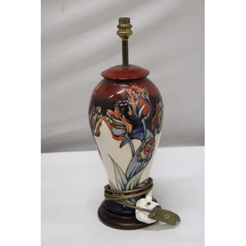 1 - A MOORCROFT POTTERY TABLE LAMP OF INVERTED BALUSTER FORM TUBELINED AND PAINTED WITH RED TULIPS PATTE... 