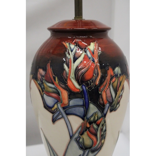 1 - A MOORCROFT POTTERY TABLE LAMP OF INVERTED BALUSTER FORM TUBELINED AND PAINTED WITH RED TULIPS PATTE... 