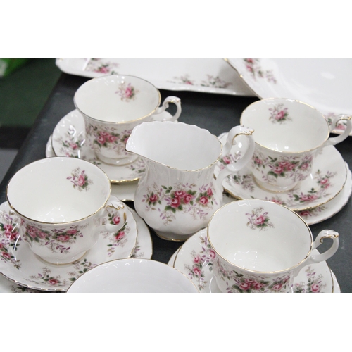 148 - A ROYAL ALBERT LAVENDER ROSE TEASET TO INCLUDE SIX TRIO'S, MILK JUG AND SUGAR BOWL, SANDWICH TRAY AN... 