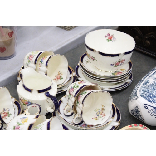 181 - A GEORGE JONES CRESCENT WARE TEA SET TO INCLUDE A CREAM JUG, SUGAR BOWL, CUPS, SAUCERS AND SIDE PLAT... 