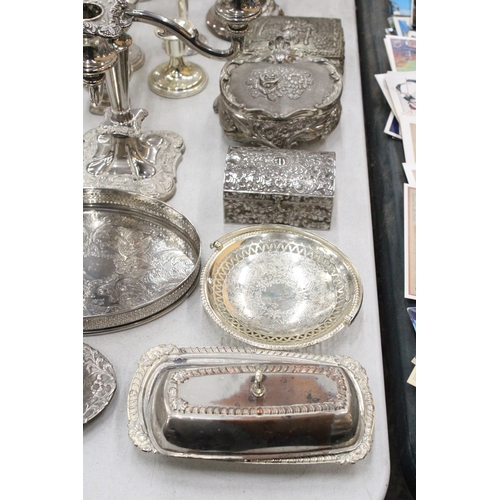 202 - A LARGE QUANTITY OF SILVER PLATED ITEMS TO INCLUDE TRAYS, CANDLEABRAS, TRINKET BOXES, ETC