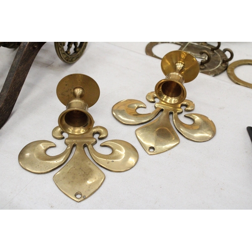 208 - A PAIR OF BRASS FLEUR DE LYS CANDLE HOLDER SCONCES