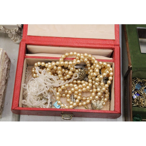 210 - A LARGE QUANTITY OF COSTUME JEWELLERY AND BOXES TO INCLUDE BROOCHES, CHAINS, NECKLACES, BRACELETS, R... 