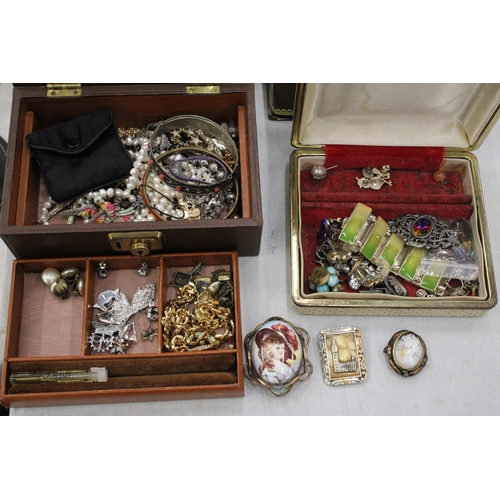 210 - A LARGE QUANTITY OF COSTUME JEWELLERY AND BOXES TO INCLUDE BROOCHES, CHAINS, NECKLACES, BRACELETS, R... 