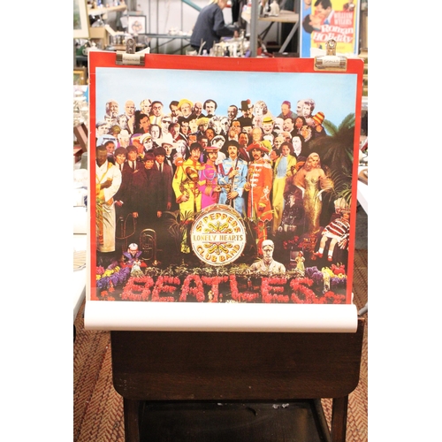 219 - A COLLECTION OF BEATLES POSTERS TO INCLUDE 'YELLOW SUBMARINE' AND 'SGT PEPPERS LONELY HEARTS CLUB BA... 