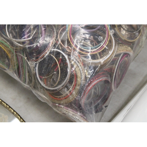 220 - AN 8KG BAG OF COSTUME JEWELLERY BRACELETS