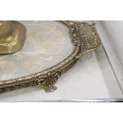 221 - A PETIT POINT EMBROIDERED DRESSING TABLE TRAY WITH A PAIR OF BRASS CANDLESTICKS