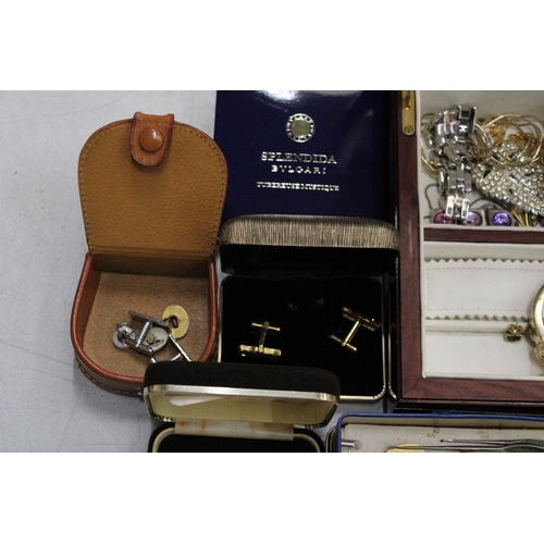 234 - A LARGE QUANTITY OF COSTUME JEWELLERY AND BOXES TO INCLUDE, BROOCHES, NECKLACES, BRACELETS, CUFF LIN... 