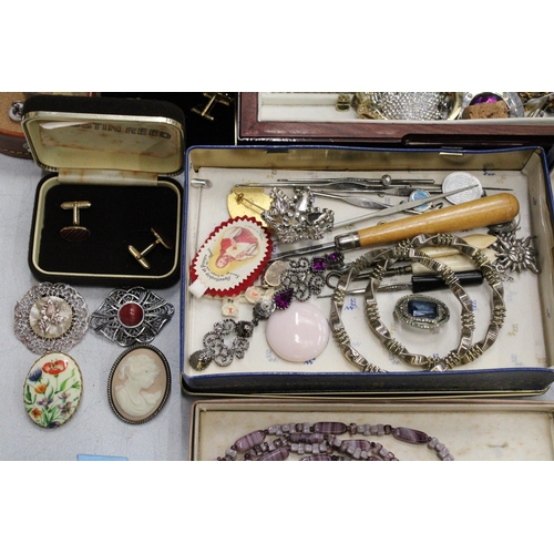 234 - A LARGE QUANTITY OF COSTUME JEWELLERY AND BOXES TO INCLUDE, BROOCHES, NECKLACES, BRACELETS, CUFF LIN... 