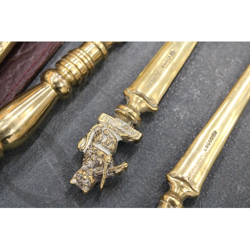 256 - A COLLECTION OF FIVE BRASS LETTER OPENERS TO INCLUDE AN ART NOUVEAU EXAMPLE