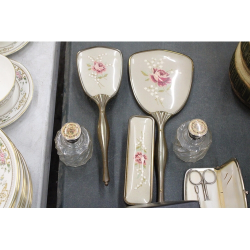 272 - A VINTAGE PETIT POINT DRESSING TABLE SET TO INCLUDE TWO SCENT BOTTLES, BRUSHES AND A HAND MIRROR, A ... 