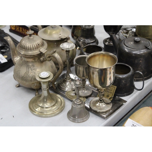 302 - A LARGE QUANTITY OF SILVER PLATE TO INCLUDE TEAPOTS, CREAM JUG, SUGAR BOWL, A TROPHY, GOBLETS, ETC