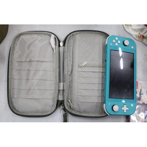 310 - A NINTENDO SWITH LITE (NO CHARGER), CASE AND TWO GAMES, ARK SURVIVAL EVOLVED AND TRIAL RISING