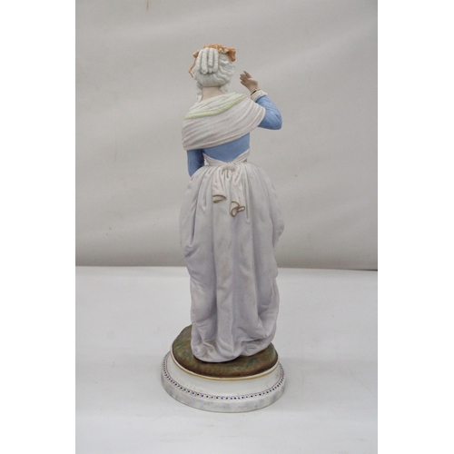 101 - A CONTINENTAL FIGURE OF A LADY IN PERIOD DRESS - APPROX 41 CM