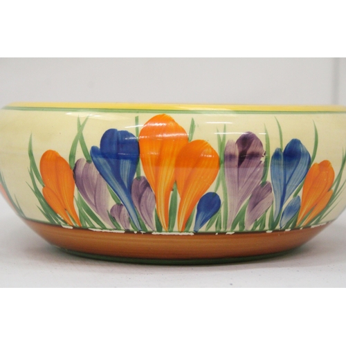 11 - A CLARICE CLIFF BIZARRE CROCUS PATTERN BOWL - 9 CM (H) 19 CM (W) (SIGNS OF WEAR)