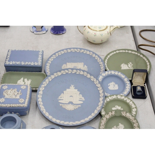 111 - A LARGE QUANTITY OF WEDGWOOD JASPERWARE TO INCLUDE CANDLESTICKS, TRINKET BOXES, PIN DISHES, CHRISTMA... 