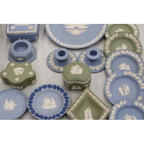 111 - A LARGE QUANTITY OF WEDGWOOD JASPERWARE TO INCLUDE CANDLESTICKS, TRINKET BOXES, PIN DISHES, CHRISTMA... 