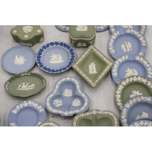 111 - A LARGE QUANTITY OF WEDGWOOD JASPERWARE TO INCLUDE CANDLESTICKS, TRINKET BOXES, PIN DISHES, CHRISTMA... 