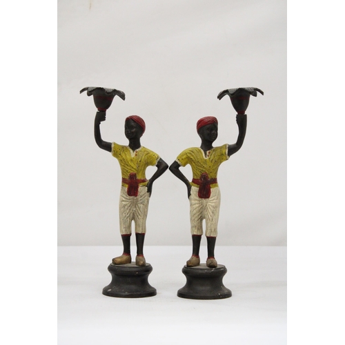 12 - A PAIR OF COLD PAINTED BLACKAMOOR CANDLESTICKS