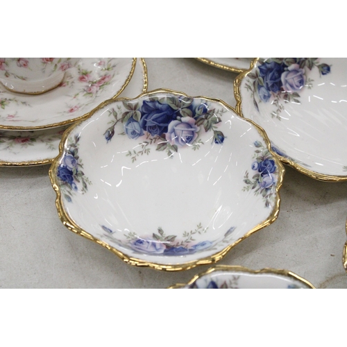 121 - A QUANTITY OF PARAGON VICTORIANA ROSE TRIO'S TOGETHER WITH FOUR ROYAL ALBERT MOONLIGHT ROSE NIBBLE B... 