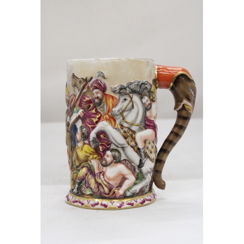 135 - AN ANTIQUE PORCELAIN CAPODIMONTE RELIEF SCENE TANKARD